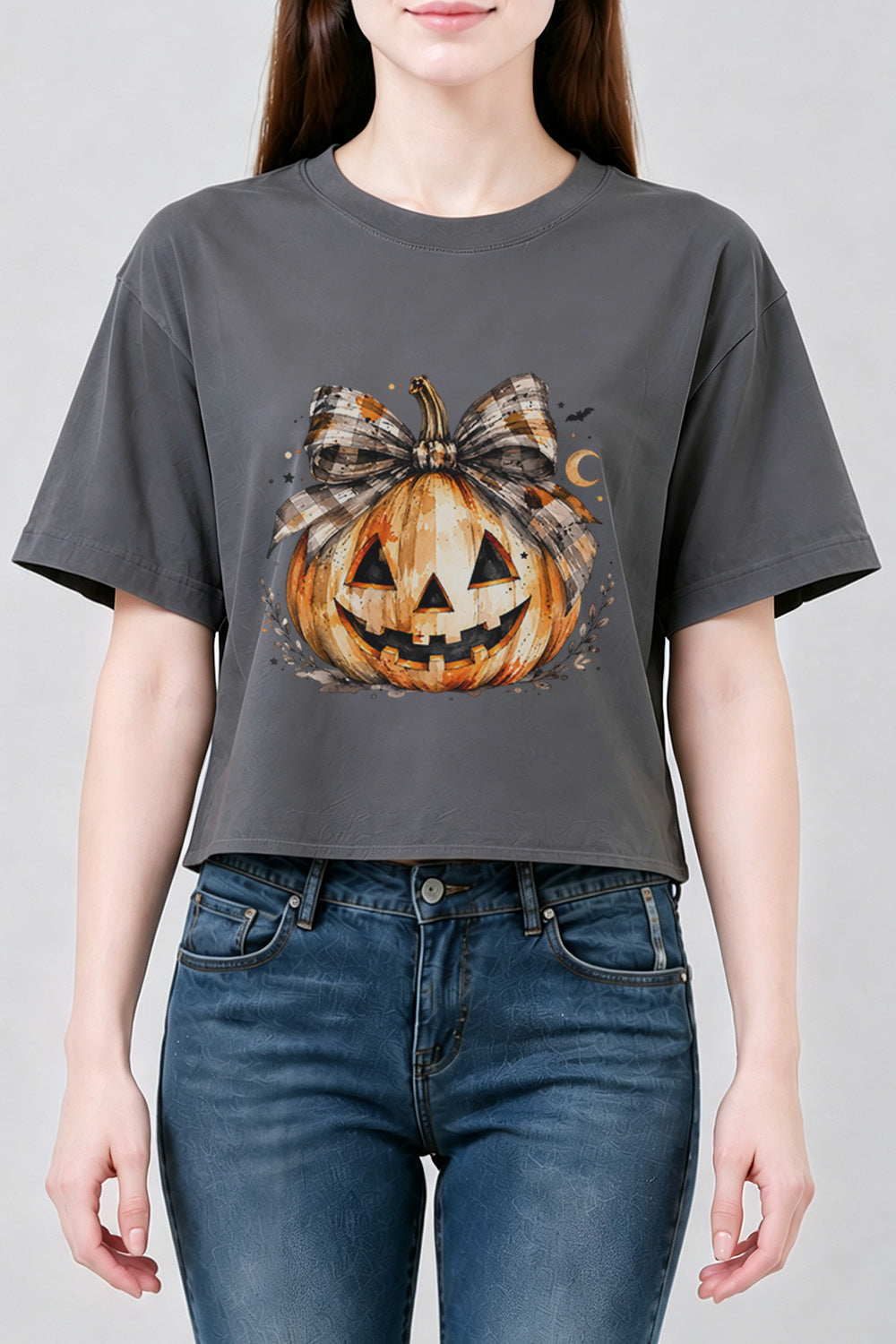 Bow-tied smiling pumpkin crop top