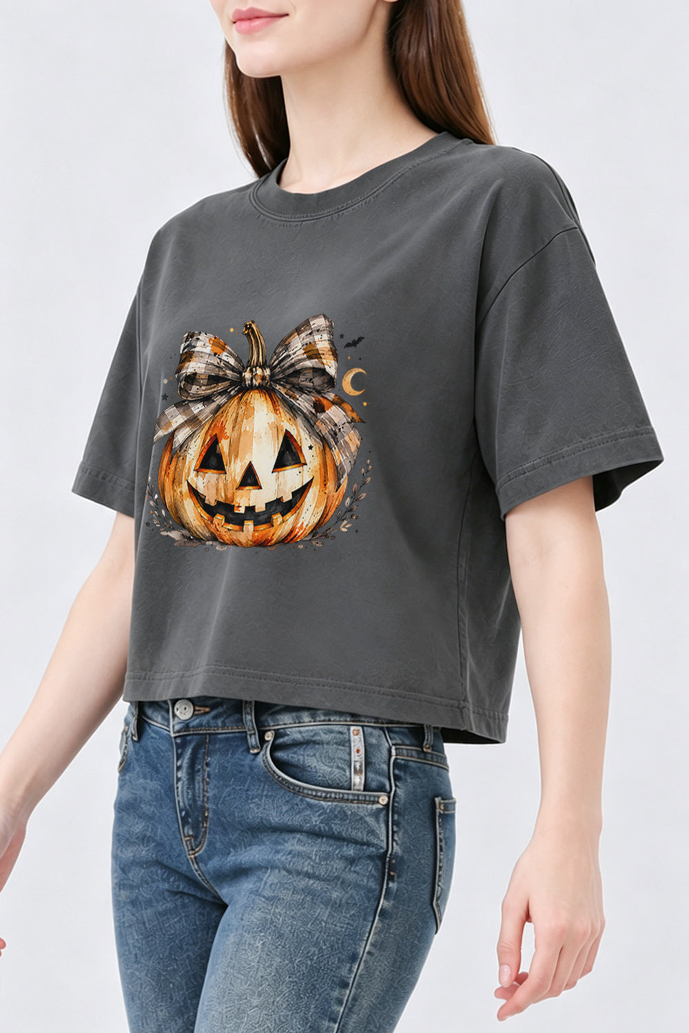 Bow-tied smiling pumpkin crop top