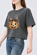 Bow-tied smiling pumpkin crop top