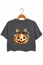Bow-tied smiling pumpkin crop top