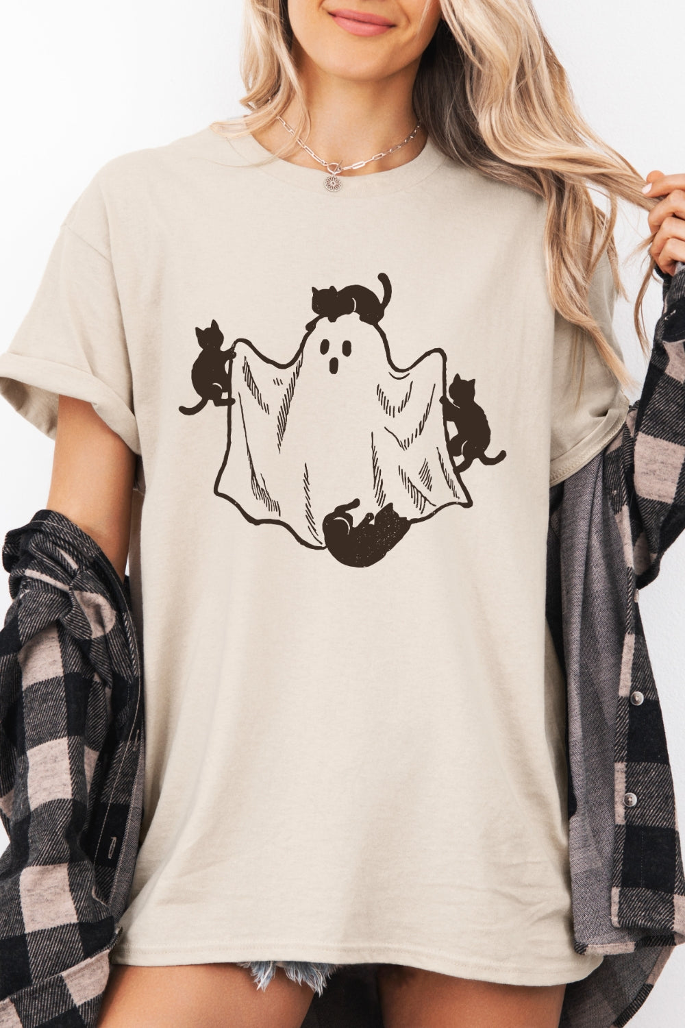 Cats playing with ghost tee