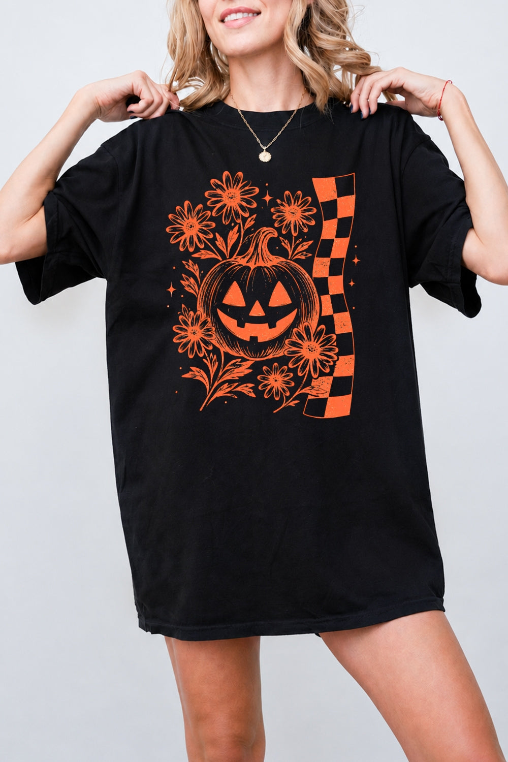 Checkerboard halloween pumpkin flower tee