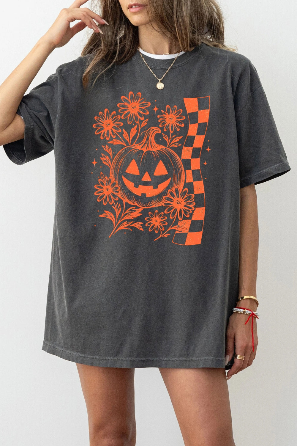 Checkerboard halloween pumpkin flower tee