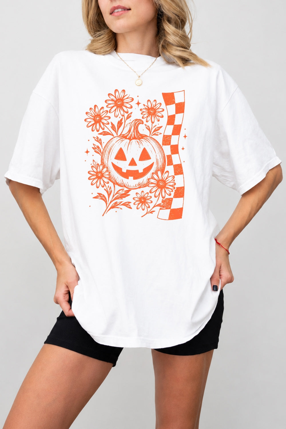 Checkerboard halloween pumpkin flower tee