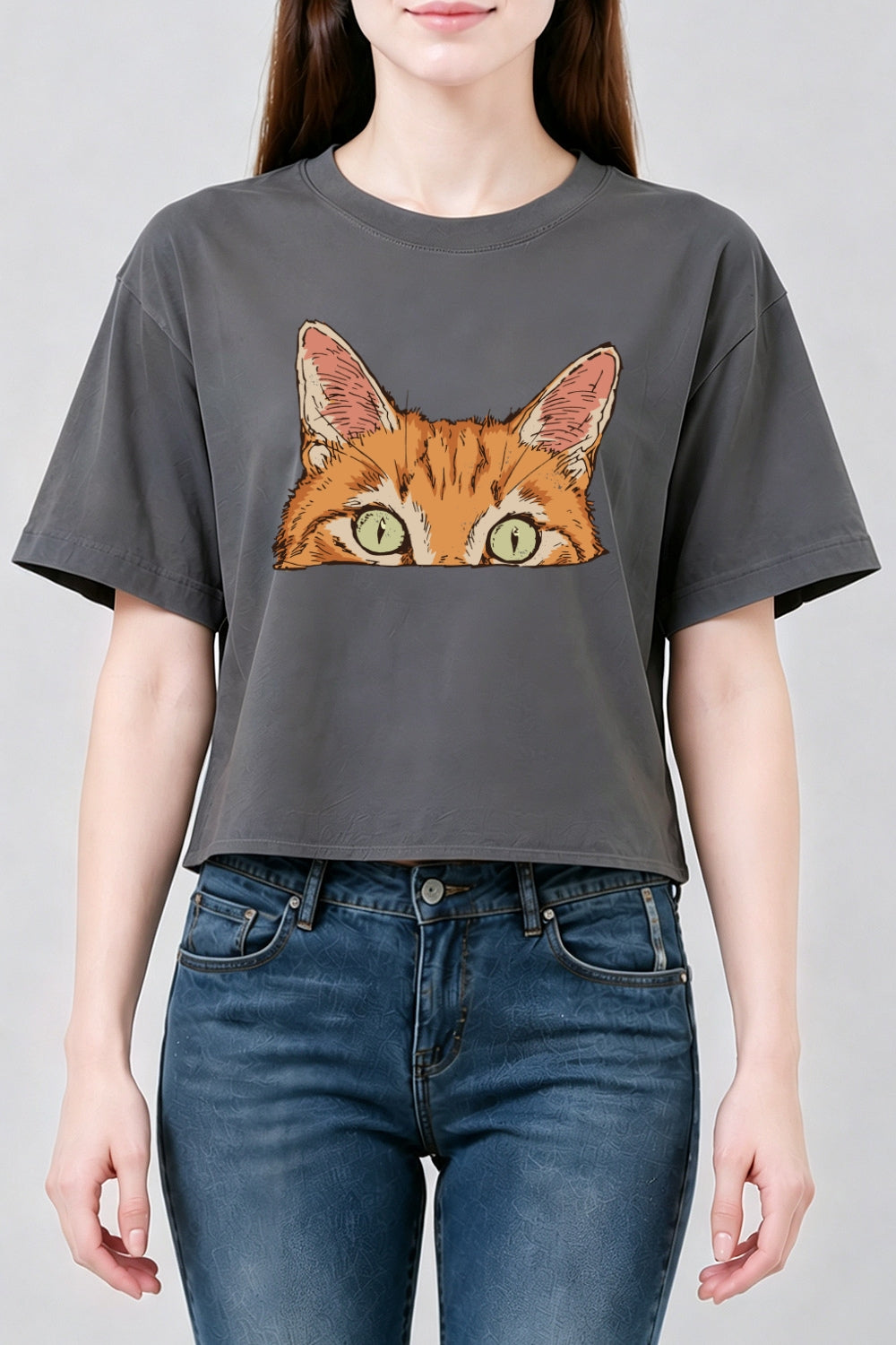 Curious orange tabby cat peeking crop top
