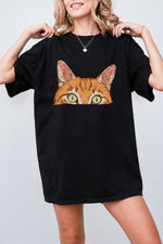Curious orange tabby cat peeking tee