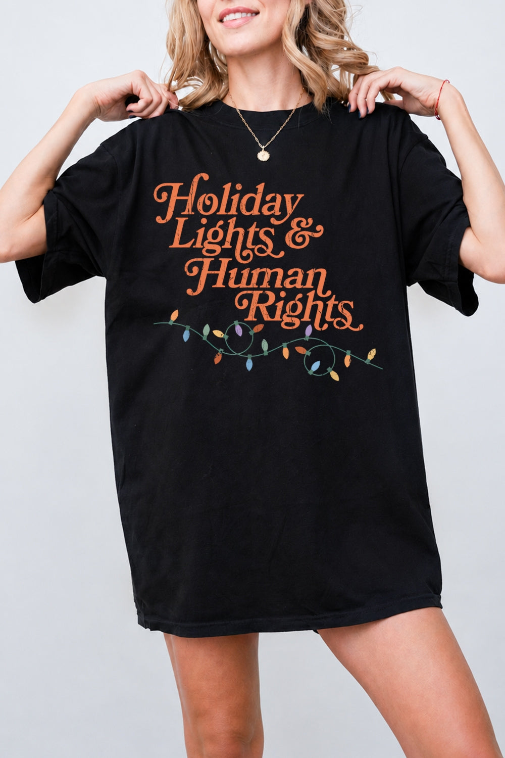 Holiday lights and human rights tee