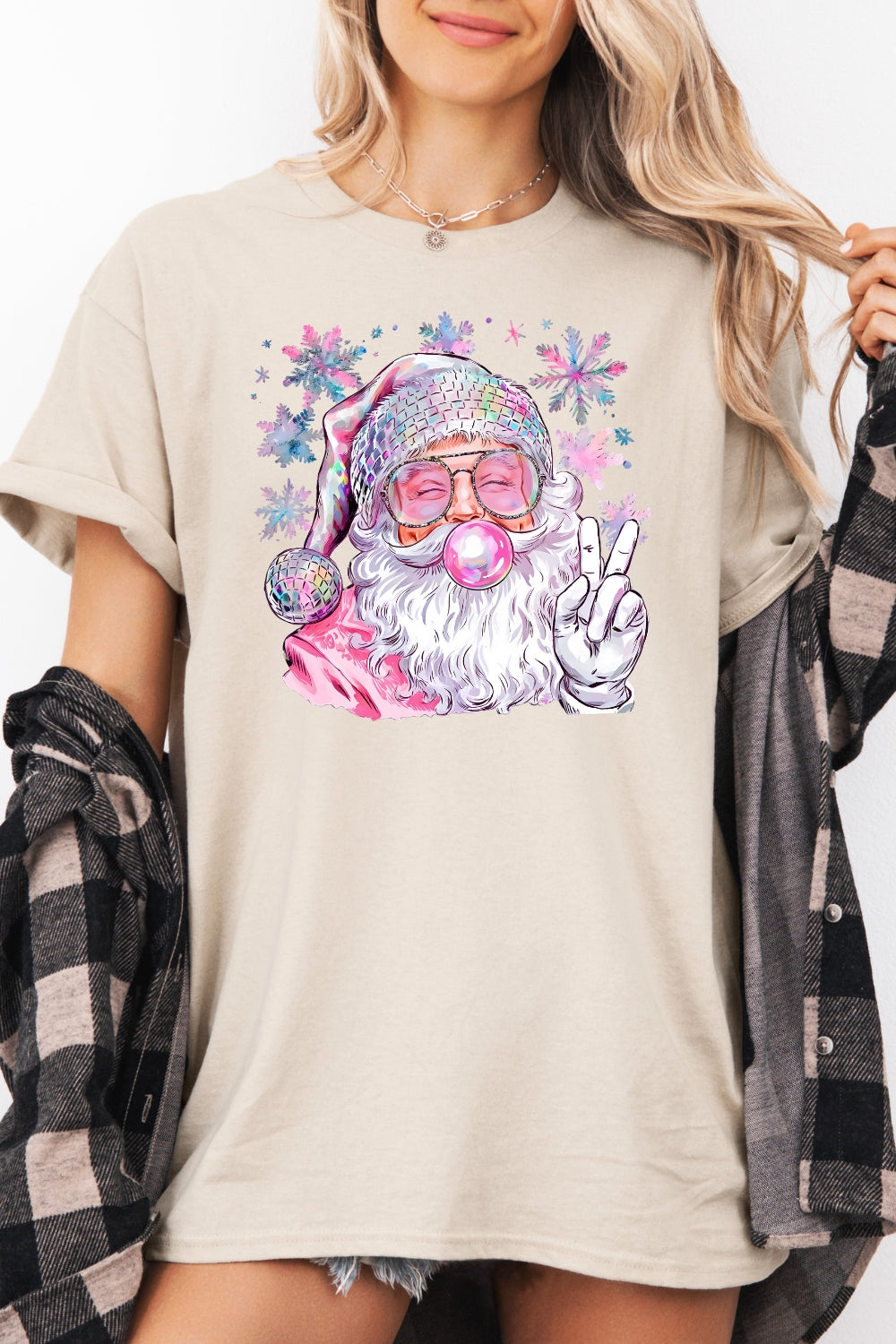 Pink santa blowing bubble snowflake tee