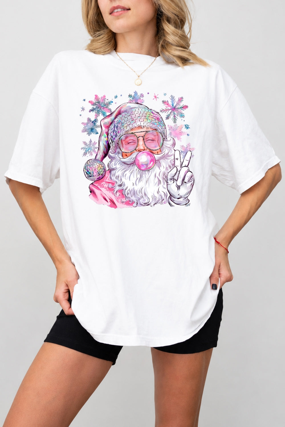 Pink santa blowing bubble snowflake tee