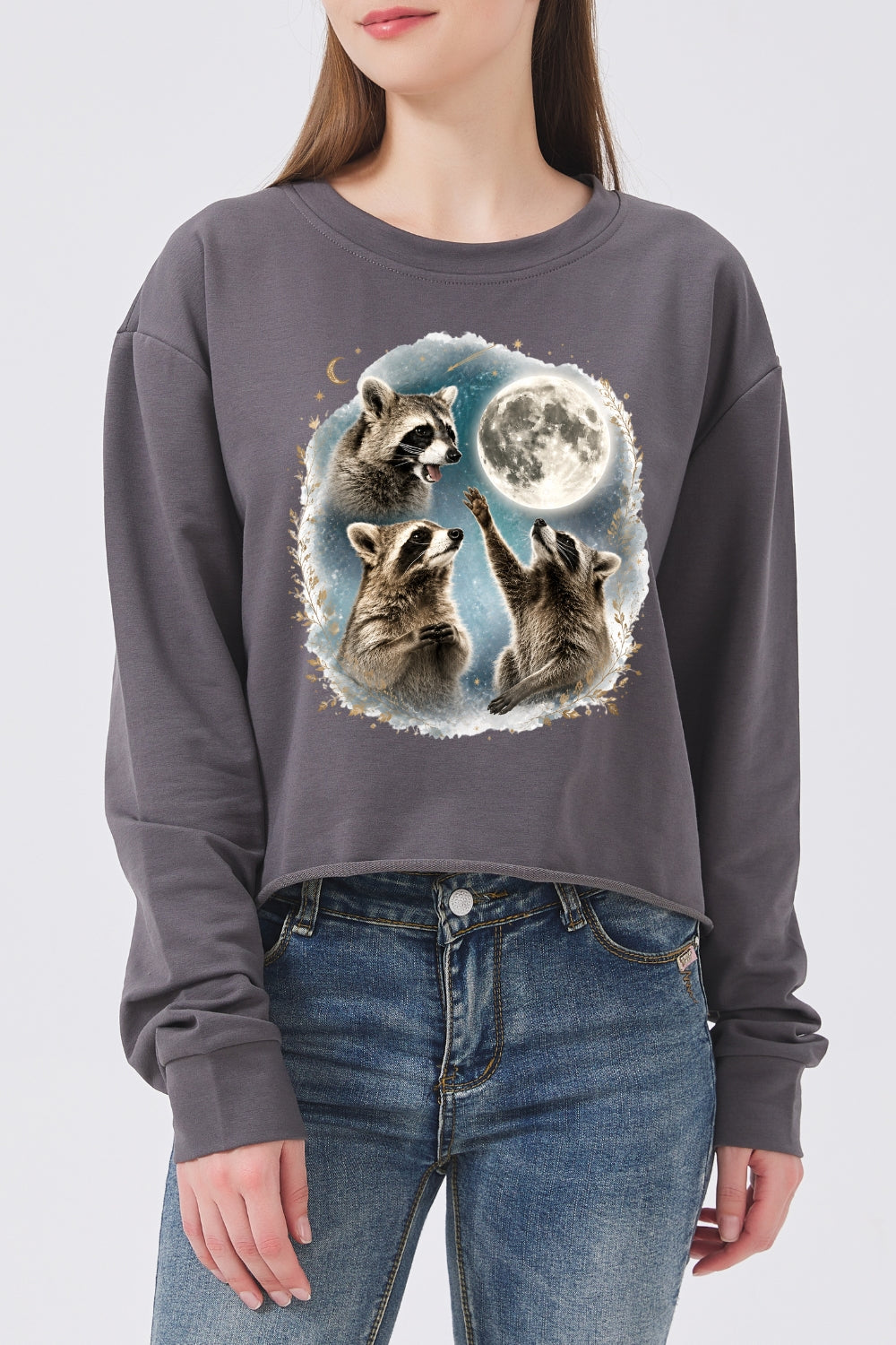 Raccoons gather around the moon crop sweatshirt