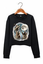 Raccoons gather around the moon crop sweatshirt