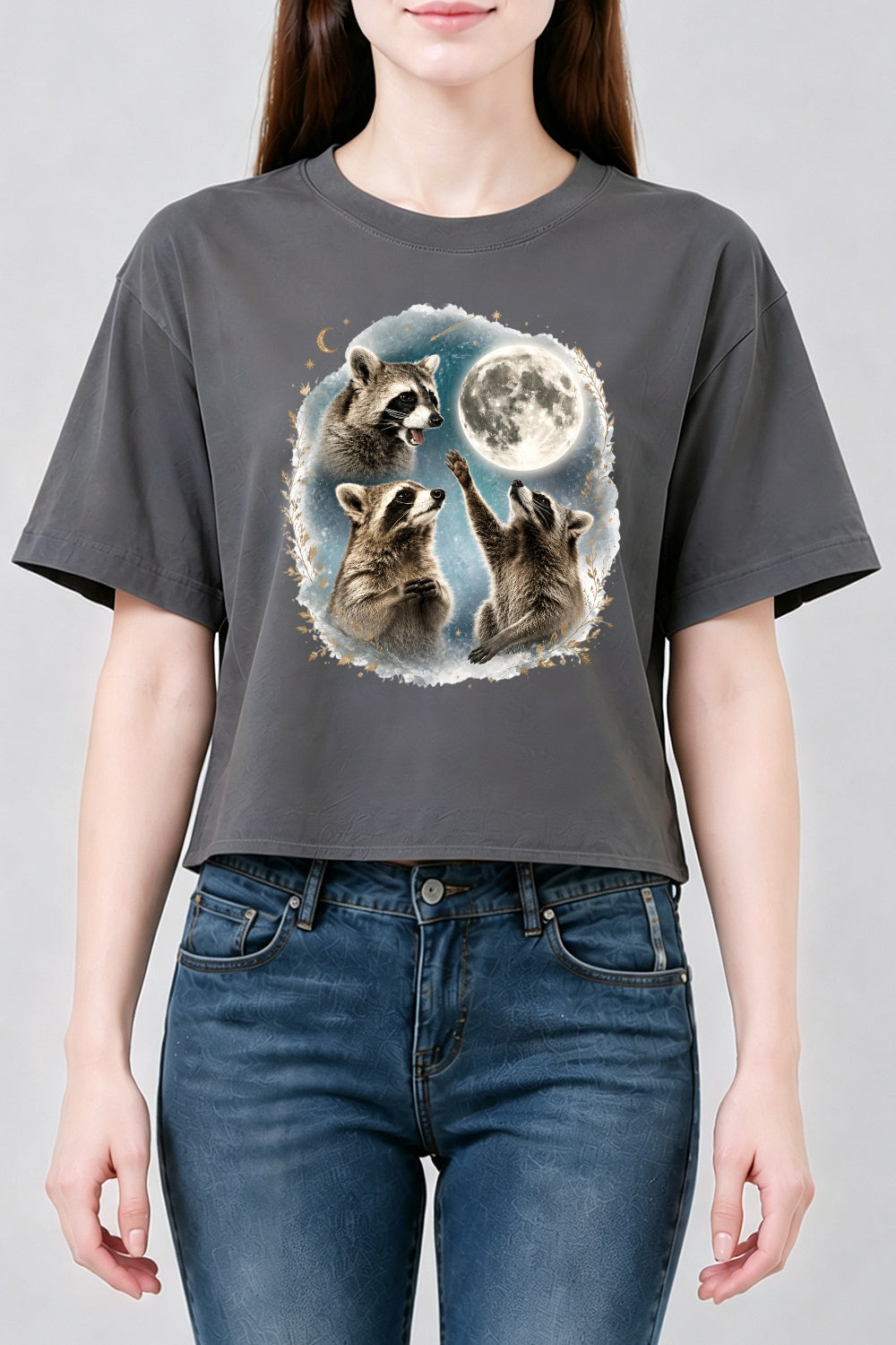 Raccoons gather around the moon crop top