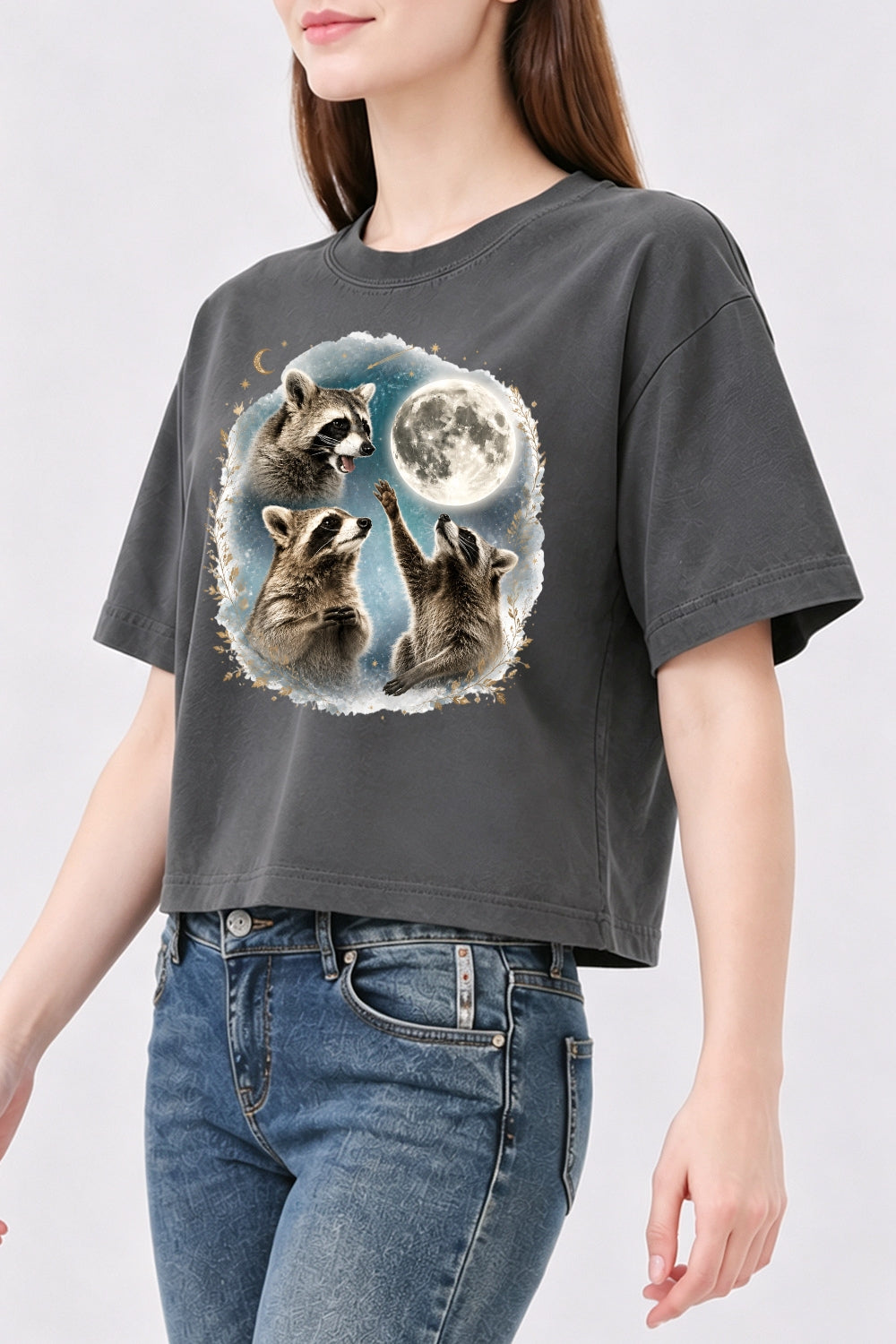 Raccoons gather around the moon crop top