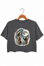 Raccoons gather around the moon crop top