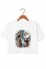 Raccoons gather around the moon crop top
