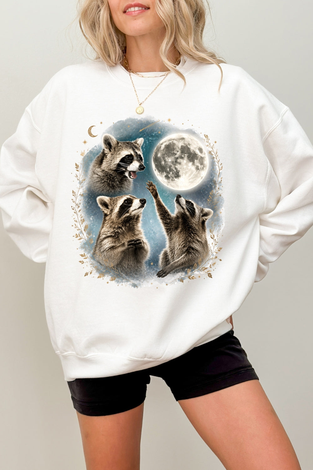 Raccoons gather around the moon sweatshirt