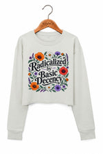 Radicalized by basic decency floral crop sweatshirt