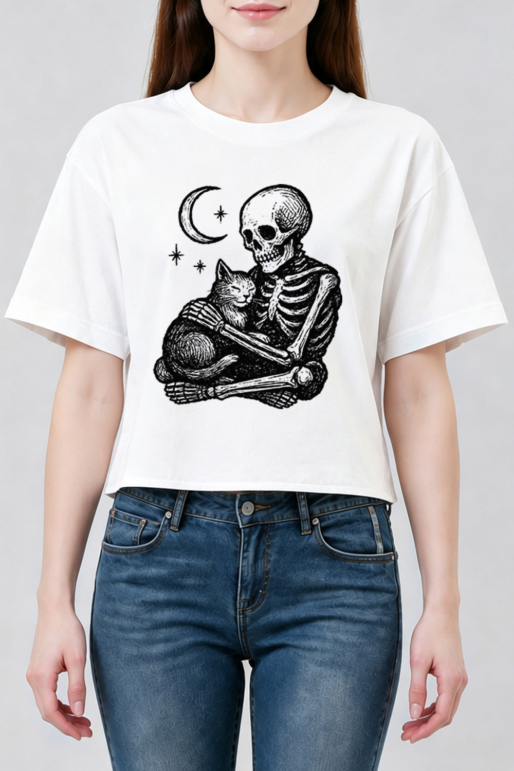 Skeleton holding a cat crop top