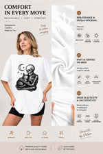 Skeleton holding a cat tee