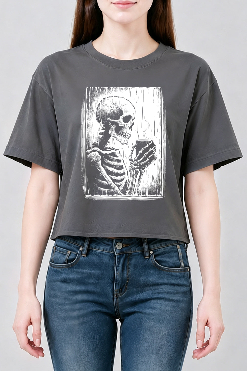 Skeleton holding a hot drink crop top