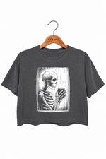 Skeleton holding a hot drink crop top