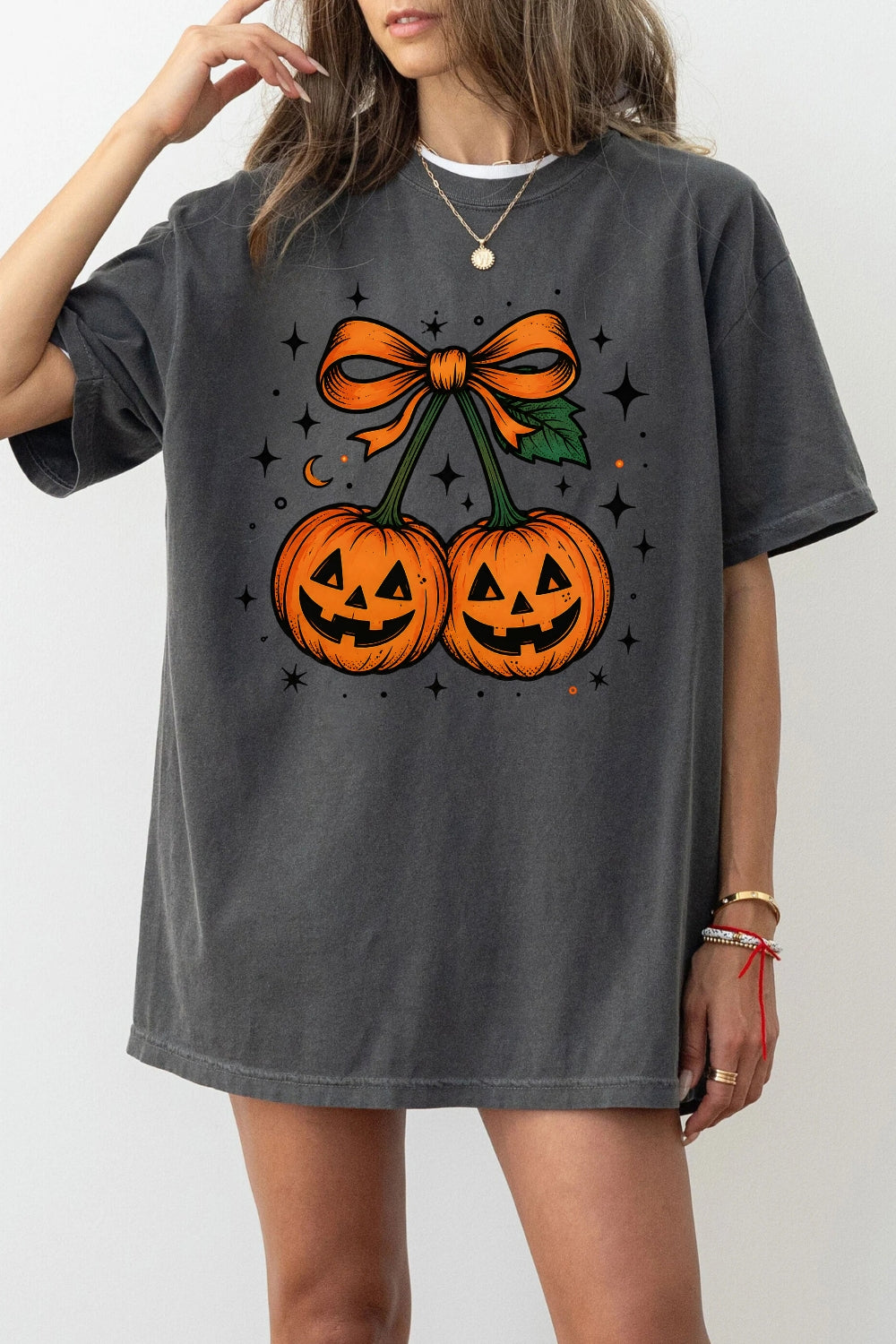 Smiling halloween pumpkin bow tee