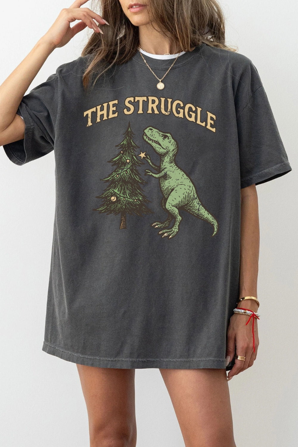 The struggle dinosaur christmas tee