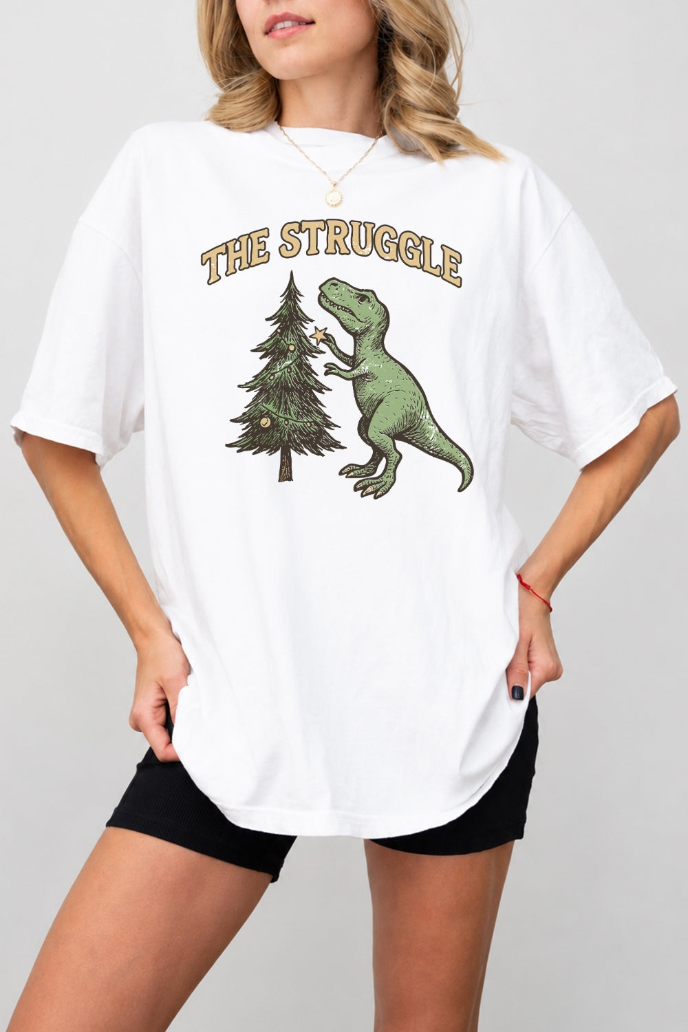 The struggle dinosaur christmas tee